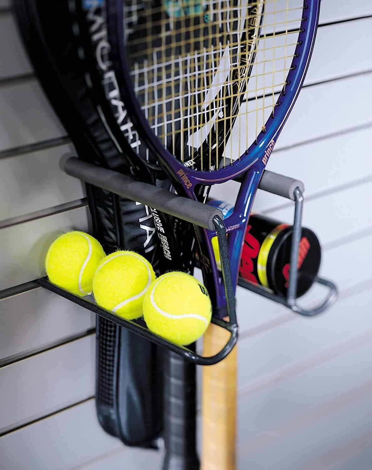 Tennis Racquet storage ideas. A hook to hold both the raquets and the balls. 