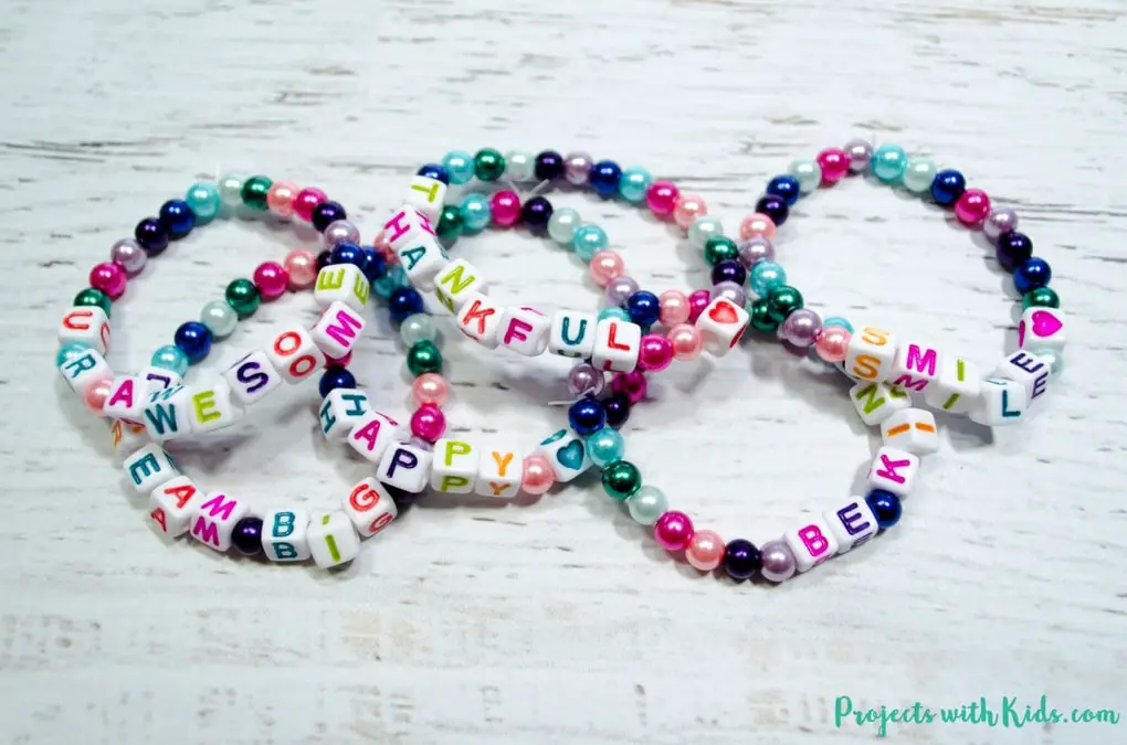 Beaded colorful bracelets with kind words